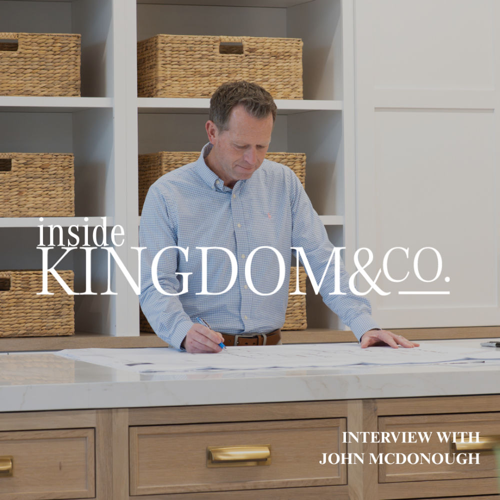 Inside Kingdom and Co. podcast interview with John McDonough in modern home office with wood shelving