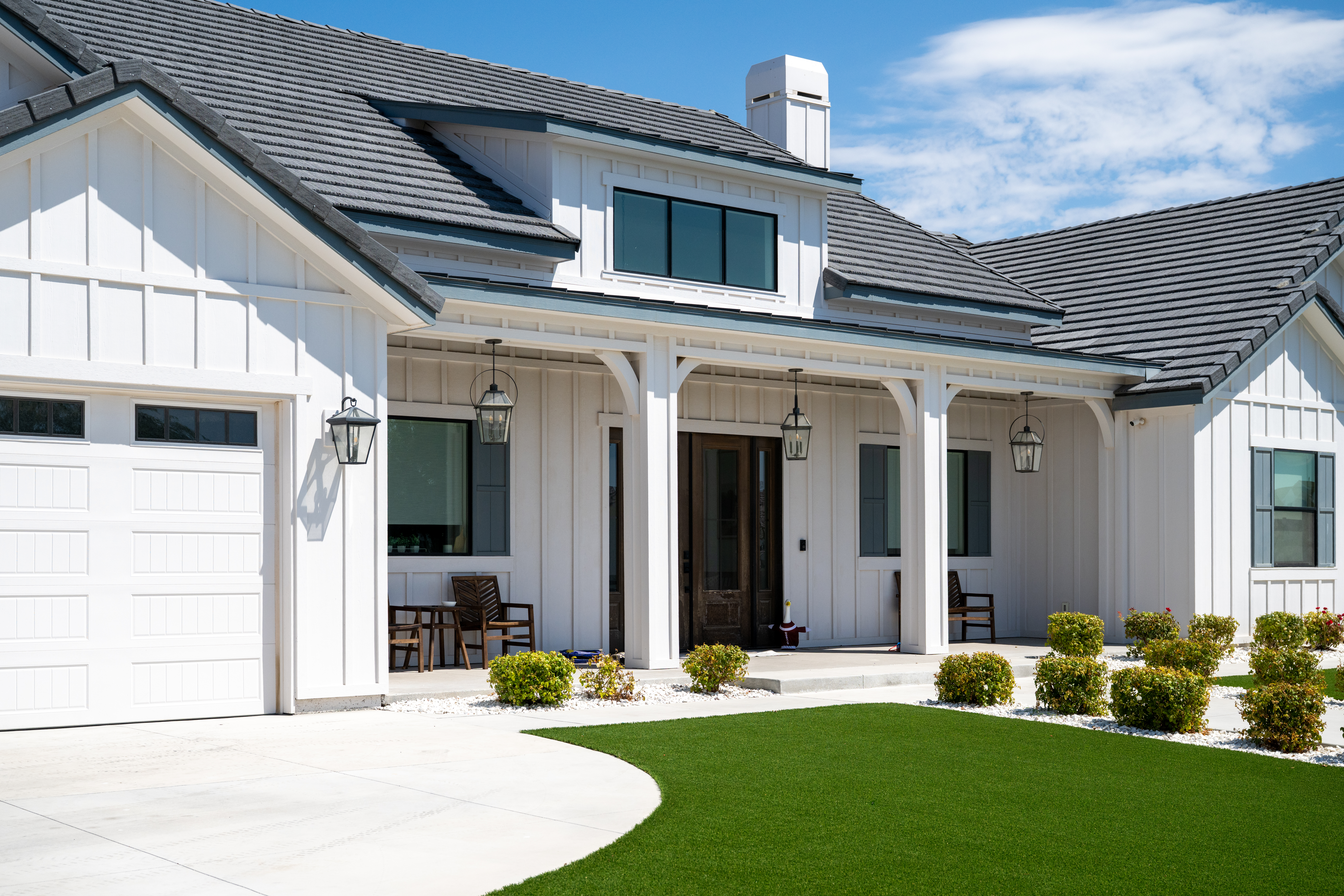 Custom farmhouse-style new build in Centennial Hills, Las Vegas by Kingdom & Co., featuring timeless architecture and modern design.