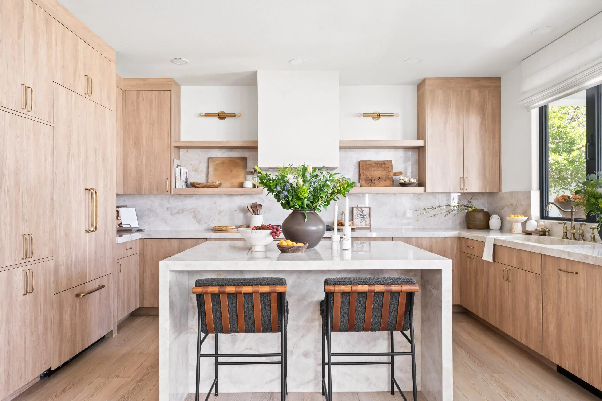 The Anush Haven kitchen remodel in Summerlin Las Vegas featuring custom cabinetry and marble island by Kingdom & Co.