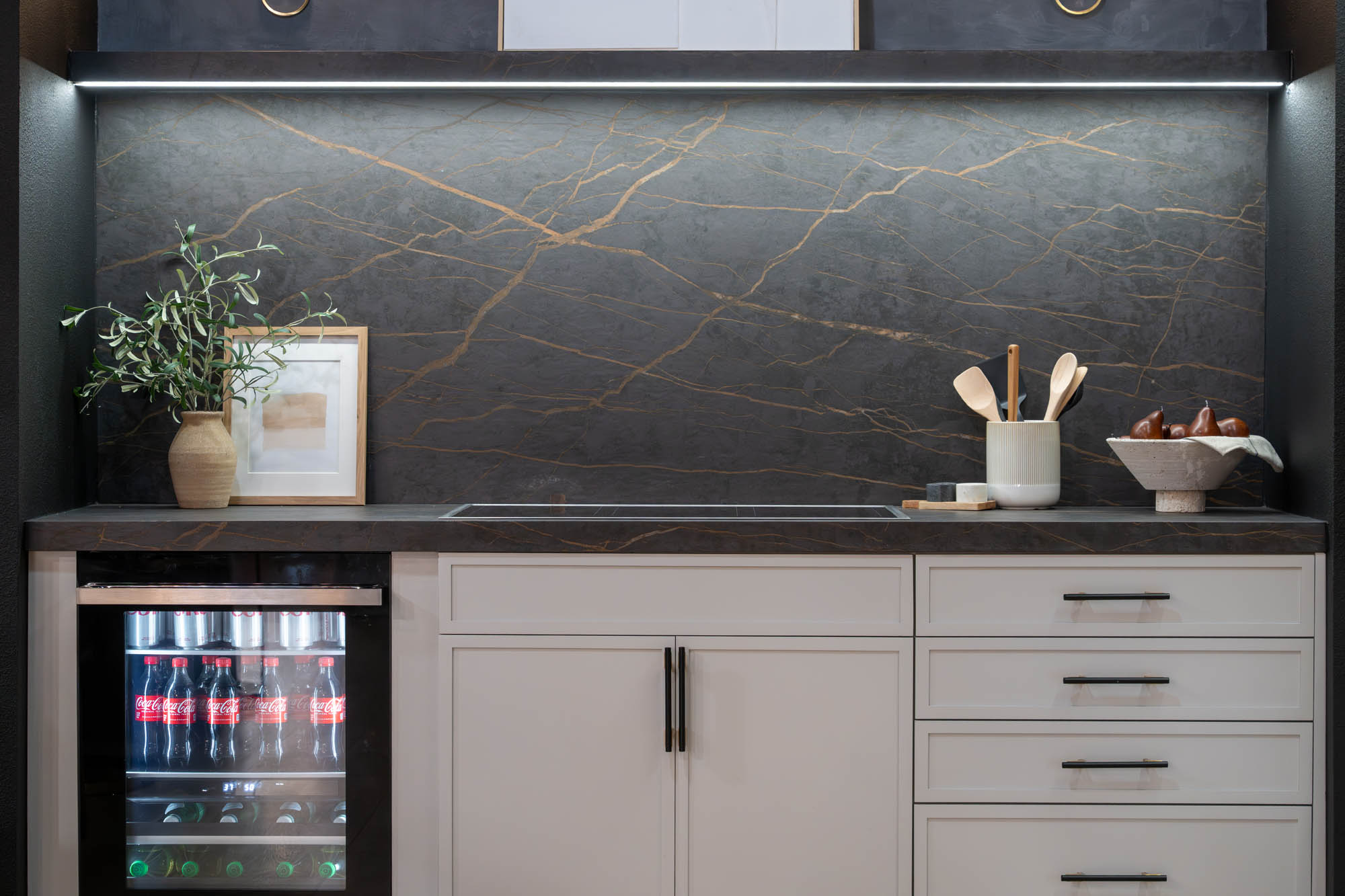 Modern kitchen with dark stone backsplash