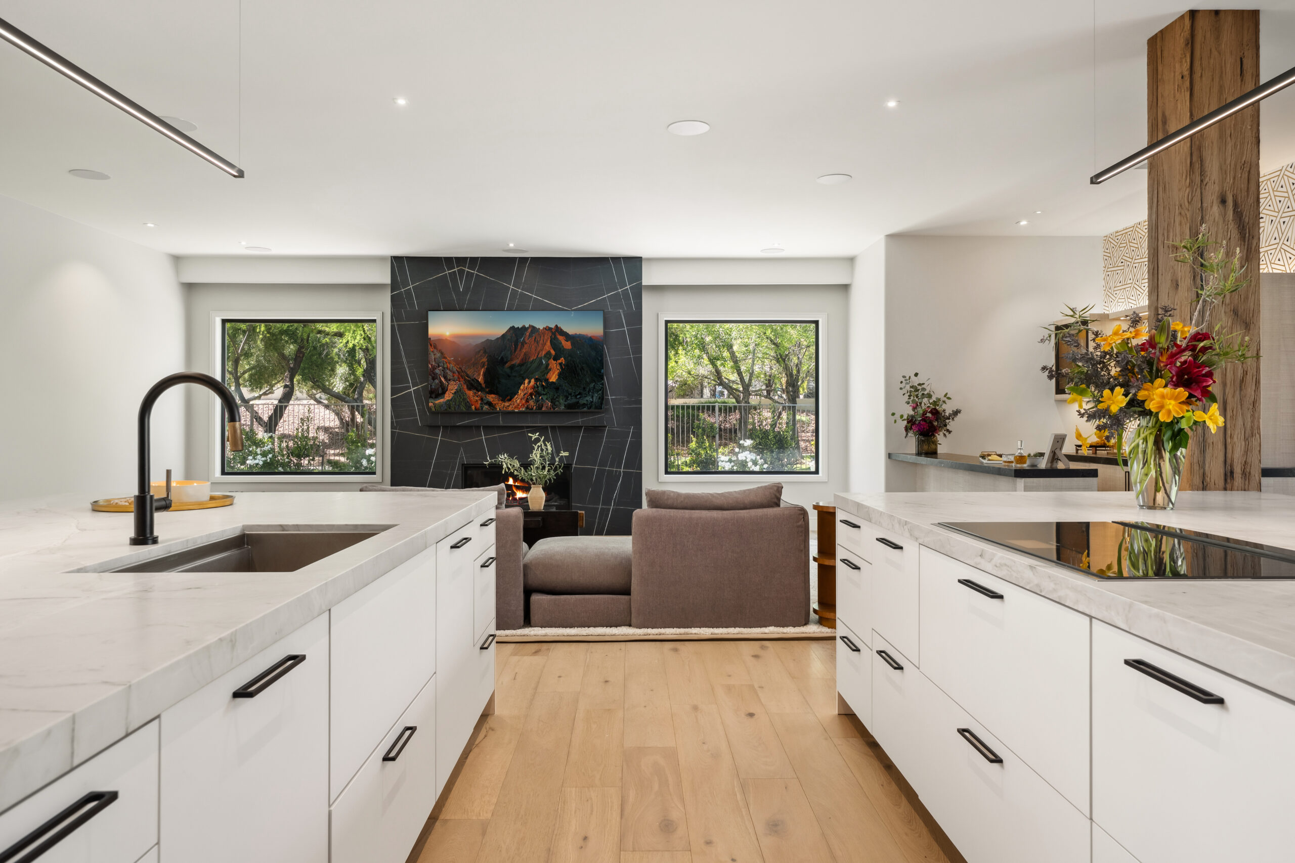 Modern kitchen with elegant living area.