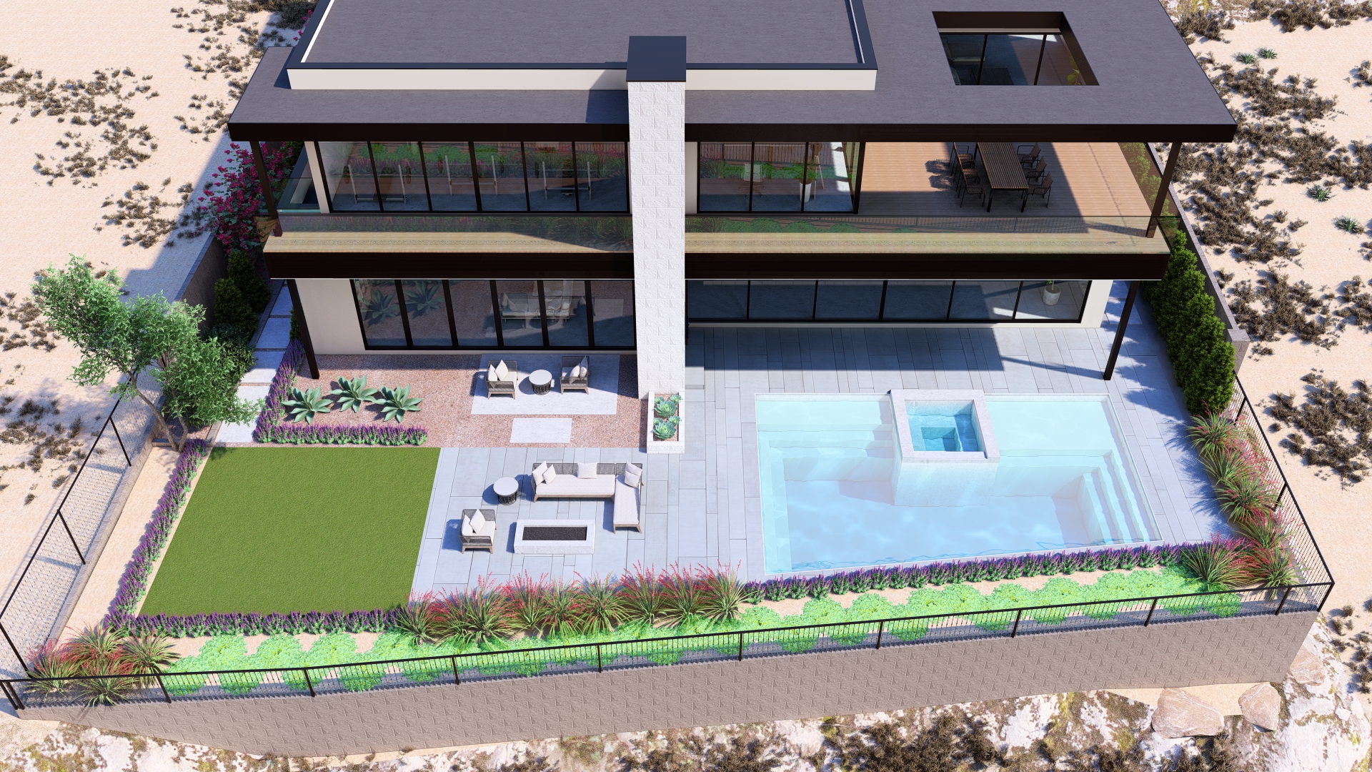 Aerial view of the backyard at Kingdom & Co.’s Ascaya home, featuring a modern pool, fire pit, outdoor lounge areas, and desert landscaping.