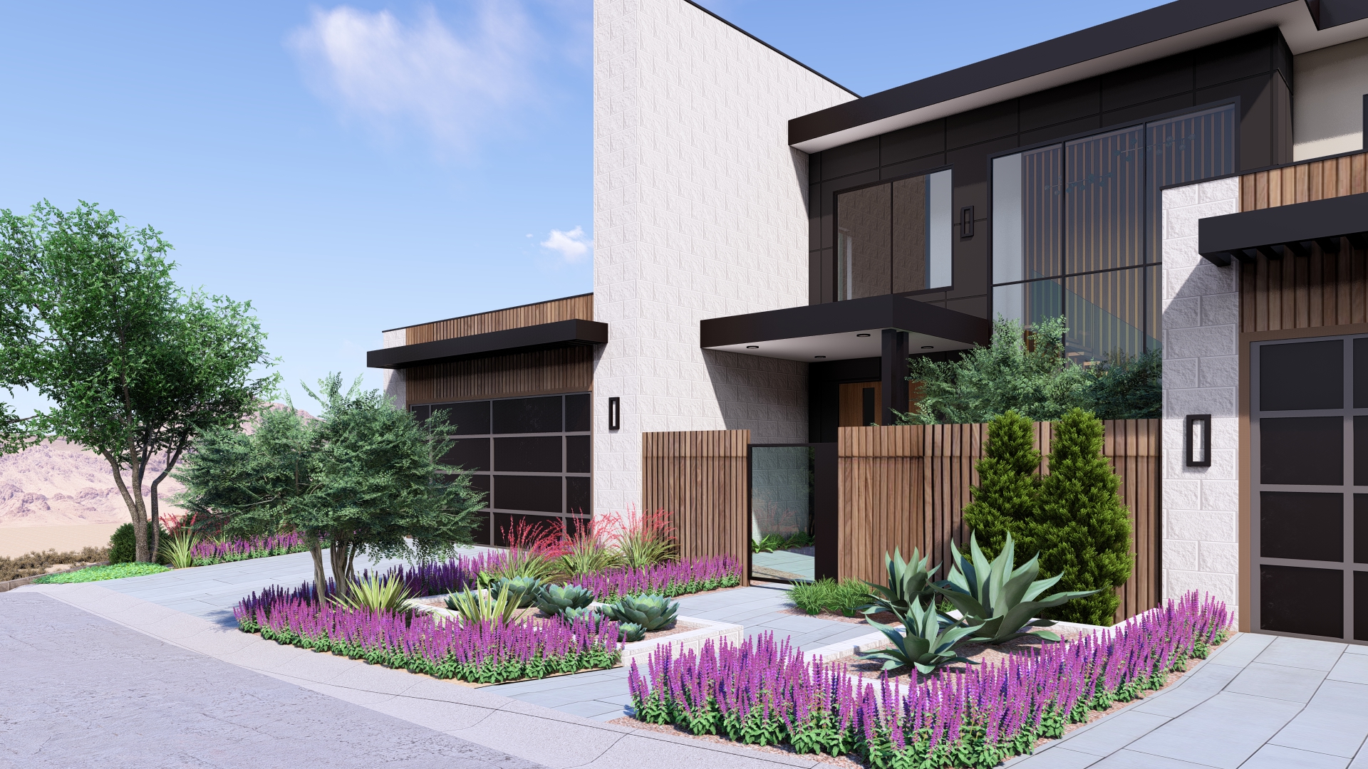 Modern biophilic-inspired front entry of Kingdom & Co.’s Ascaya luxury home, featuring desert landscaping, wood accents, and clean architectural lines.