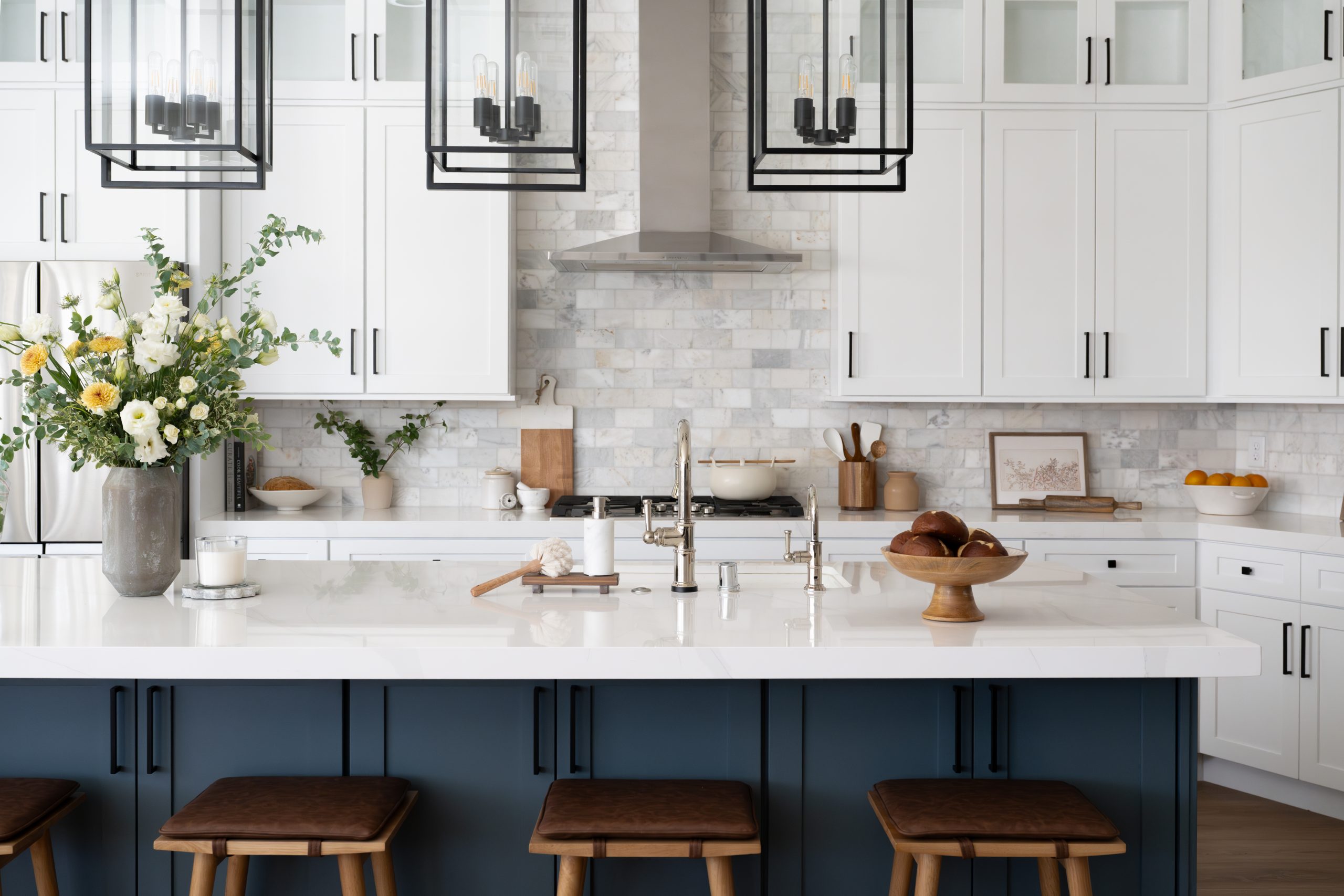 Summerlin kitchen remodel after, full-height marble tile backsplash and brushed brass