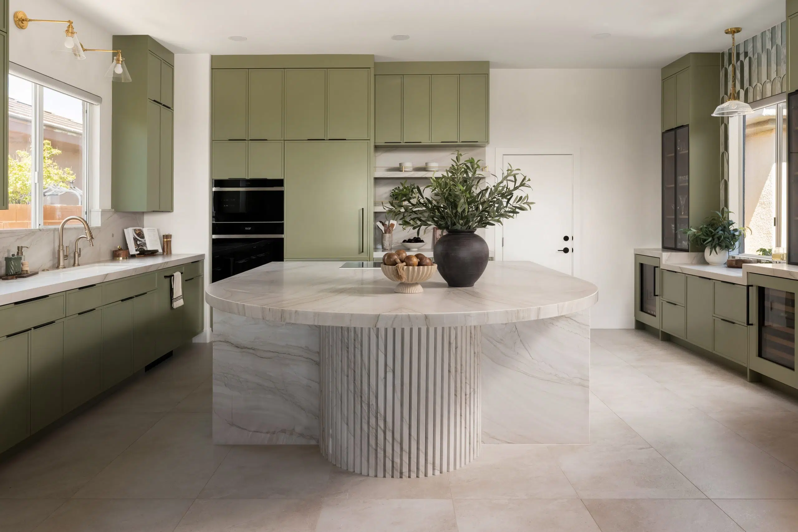 Modern kitchen with green cabinets