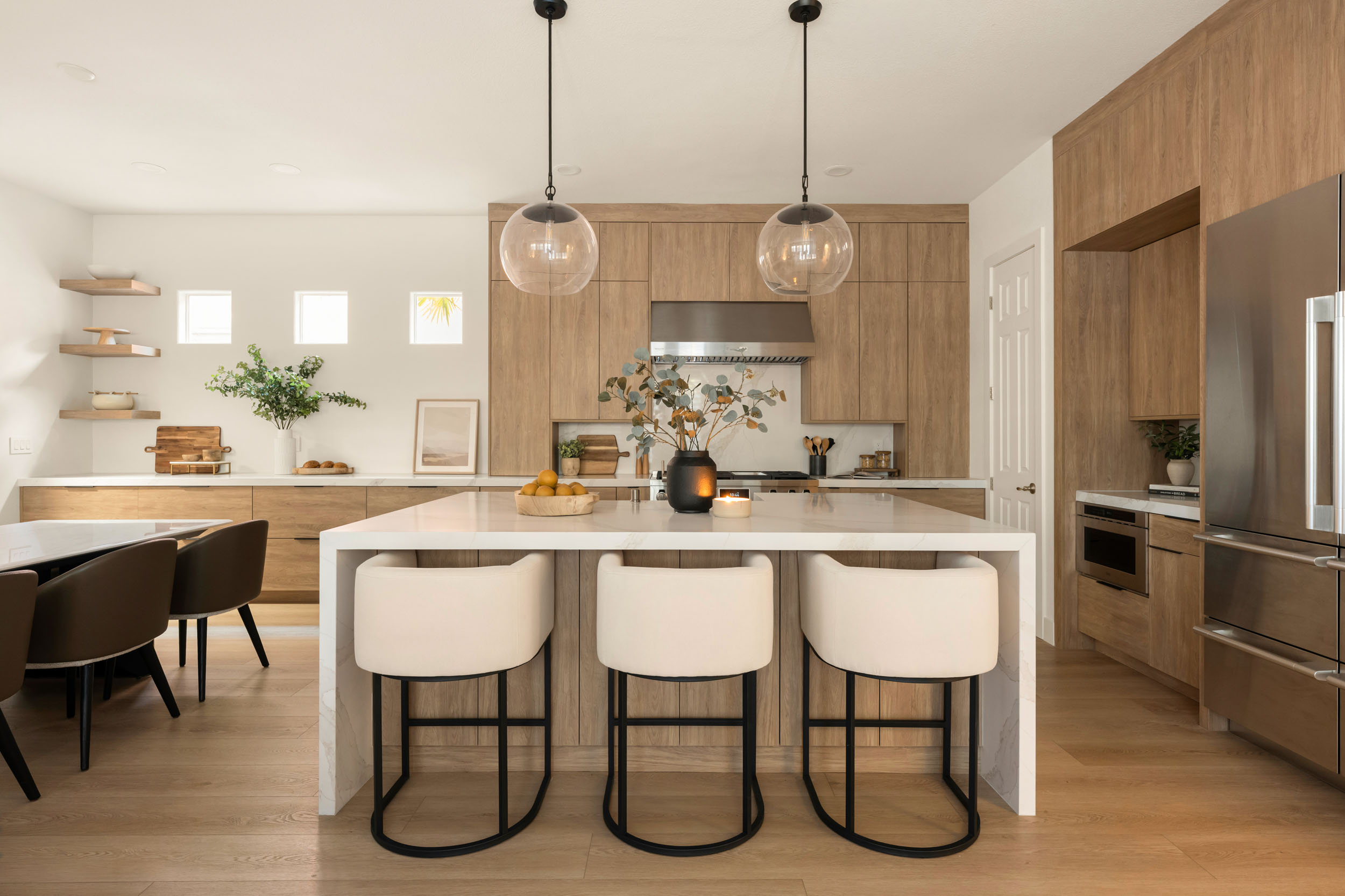 The_Elysian_SummerlinRemodel_Kingdom63 Modern kitchen with elegant design elements.